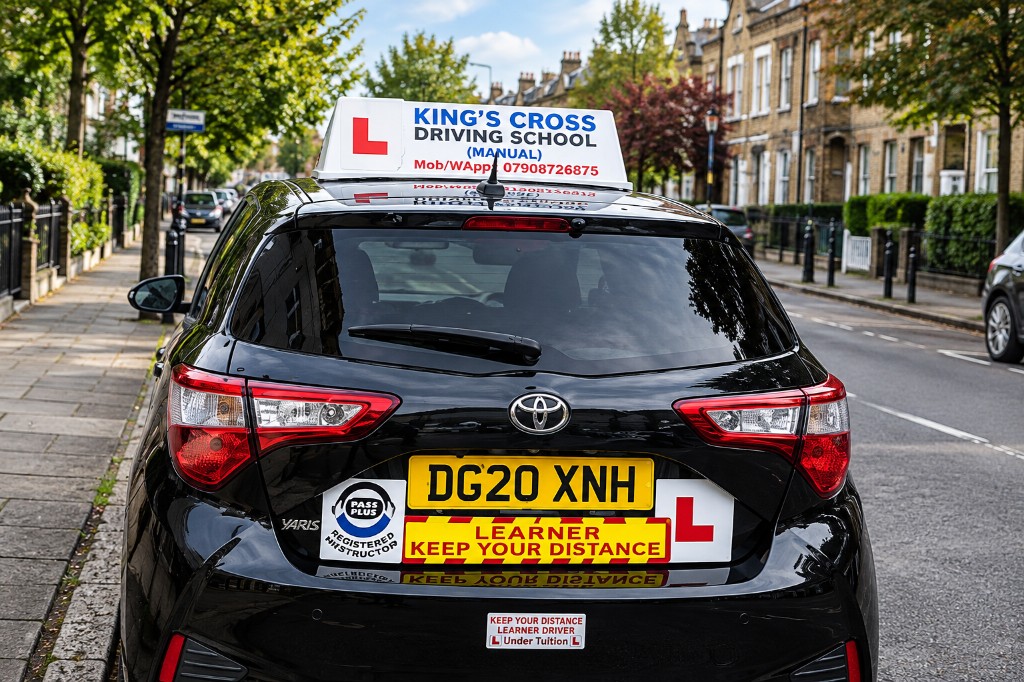 King's Cross Driving School black Toyota Yaris with L plates